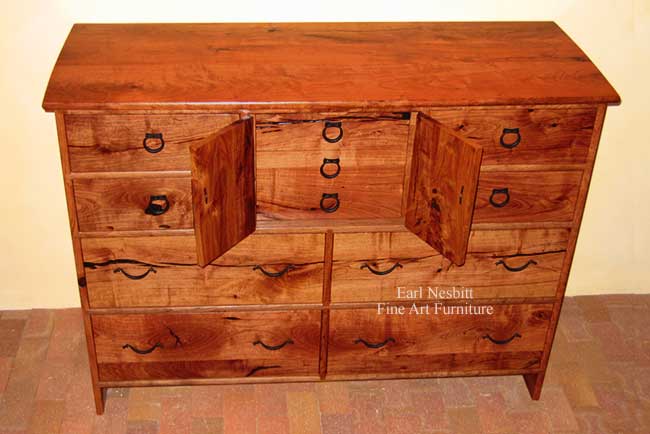 custom made bedroom dresser with doors open showing three center drawers
